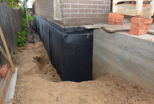 Happy homeowners after waterproofing job in Hinckley